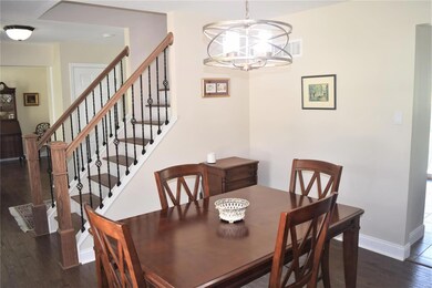 Formal dining room.  New light fixture, hardwood f