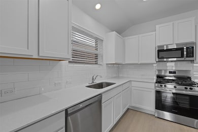 Kitchen featuring stainless steel appliances, lof