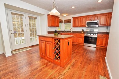Great kitchen island with a build in wine rack.