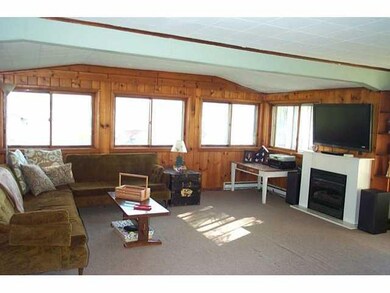 Living Room. Livingroom with wall of windows looki