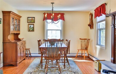 Formal Dining Area Features Ample Light and  Firep