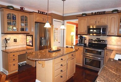 Maple Cabinetry, Granite Counters, Stainless Steel