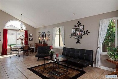 Living room and dining room with beveled glass win