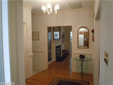 Foyer - Foyer with Coat Closet and Hardwood Floor