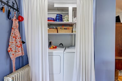 Laundry closet in kitchen.