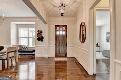 Foyer with custom trim.