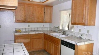 KITCHEN WITH DISWASHER.  NO STOVE