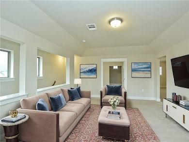 Living room featuring baseboards, light colored c