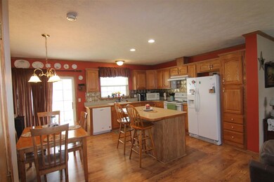 Large eat-in kitchen, oak cabinets, and island!