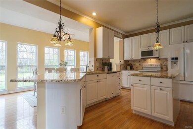 Large kitchen is open to the morning room and fami