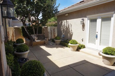 COURT YARD WITH GUEST HOUSE TO THE LEFT.