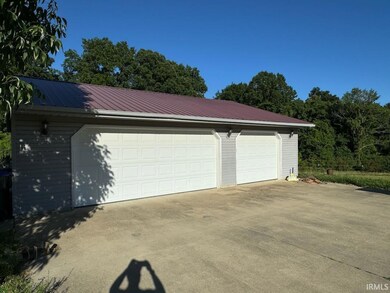 3 car detached garage.