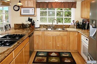 Beautiful maple cabinetry with storage galore.