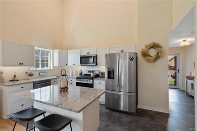 As you enter in through front door the coat closet is to your right as well as the laundry room.