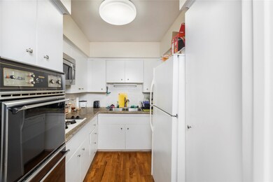 Kitchen is bright and has updated counter tops