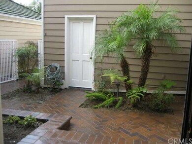Private key gated courtyard in front entry