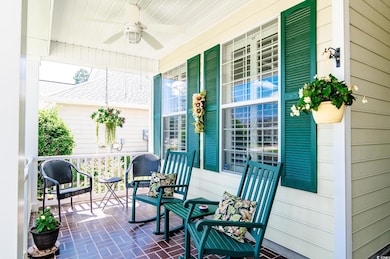 Front porch with ceiling fan