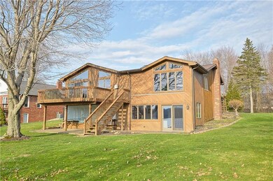 Rear view of home - large deck with access to rear