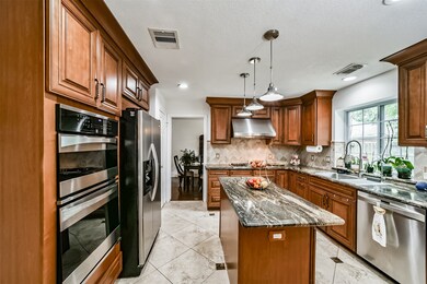 7411 Magnolia Shadows Ln, Houston, TX 77095 - photo 4