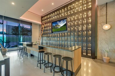 Community bar area featuring floor to ceiling win