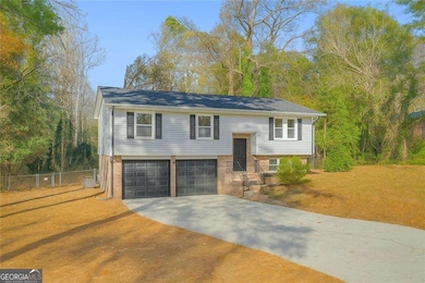 6956 Kimberland Gardens Ln, Lithonia, GA 30058 - photo 2