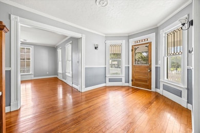 Entryway featuring hardwood / wood-style flooring
