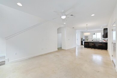 Unfurnished living room with ceiling fan, recesse