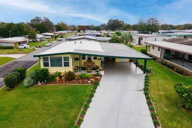 Full aerial view of property, situated on corner lot.