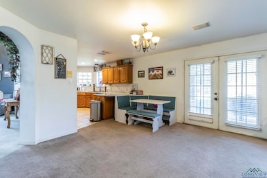 Interior space with french doors, plenty of natura