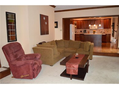 Kitchen overlooks family room.