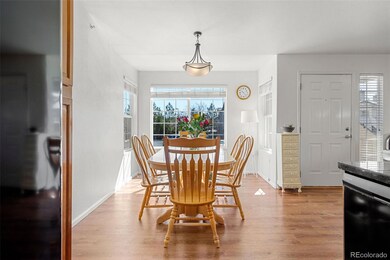 Dining area with 3 sides of windows; Light galore