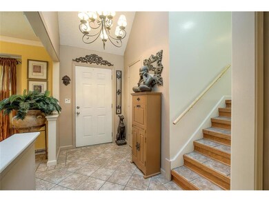 Entry with dining room to left.