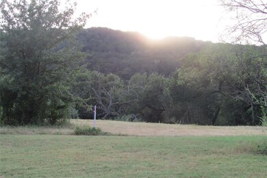 White T-post marks the West Property Boundary of L