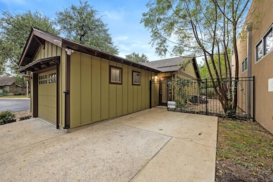 This angle shows the secondary entrance should one want to use the bedroom space as an office to meet clients. Bonus private parking space as well!