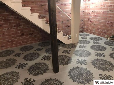 A few extra cloths racks under the open stairs