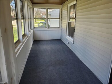 COZY FRONT PORCH WITH CARPETING