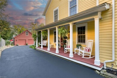 Its white picket fence and charming side porch gre