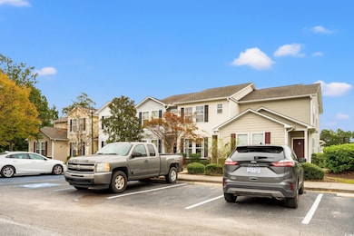 View of front of home with uncovered parking