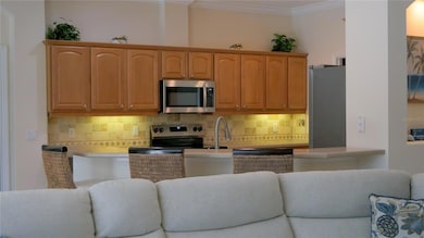 Kitchen bar area open to family room