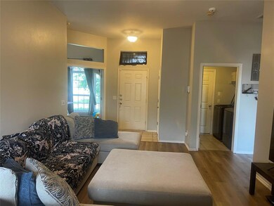 Living room featuring hardwood / wood-style floori