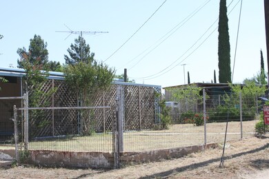 Front of house with large yard