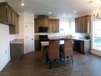 Roomy kitchen with 5 ft x 3 ft island