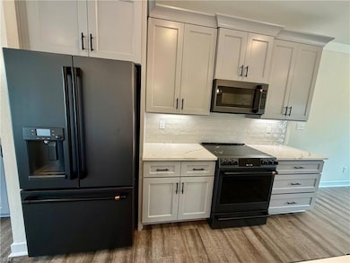 Sample photo GE Cafe black matte appliances