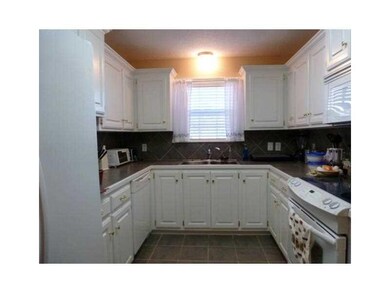 Kitchen. Kitchen window faces east and front to gr