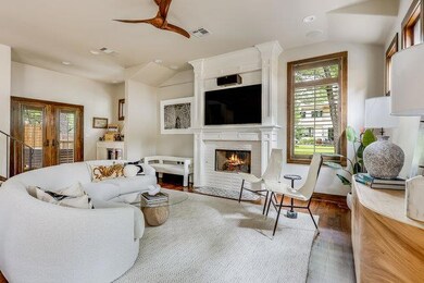 Living area with lofted ceiling, wood finished fl
