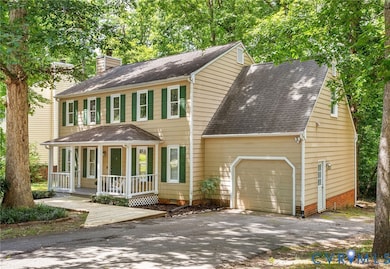 Hard-Surfaced drive with additional parking space.