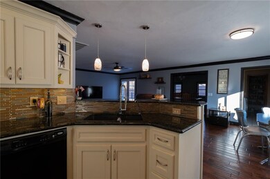 Large remodeled kitchen has plenty of work space a