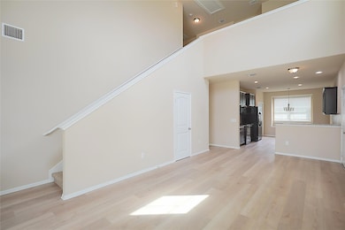 Unfurnished living room featuring light wood-styl