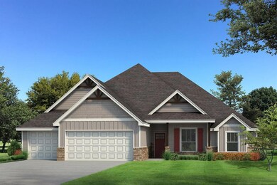 Craftsman inspired home with a front lawn and a ga