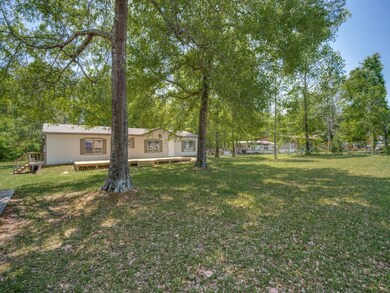 13660 Pinewood Village Dr, Conroe, TX 77302 - photo 2